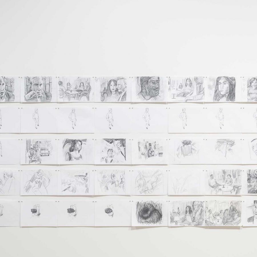 Dessins de Bourouissa accroché sur un mur d'exposition.